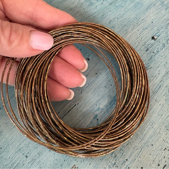 Gold-Tone 43 Interlocking Bangle Bracelets - Picture 9 of 9